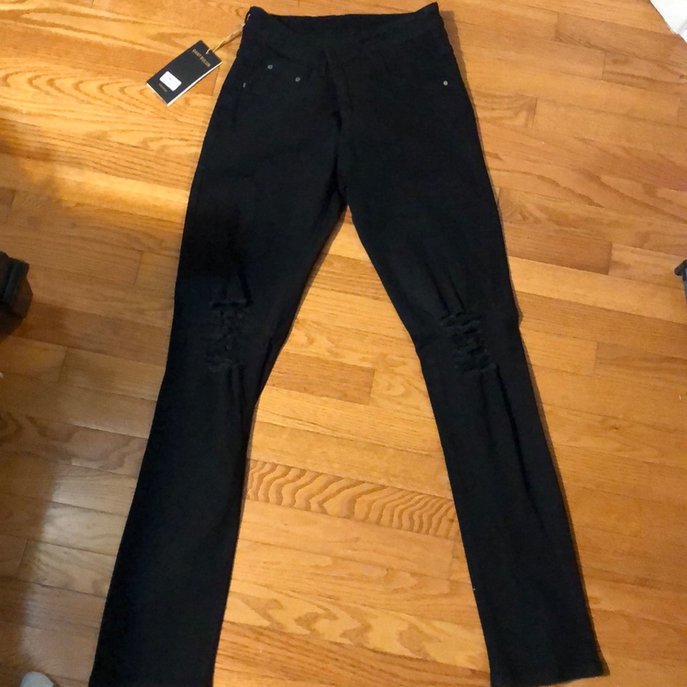 Black ripped jeans. Slim fit